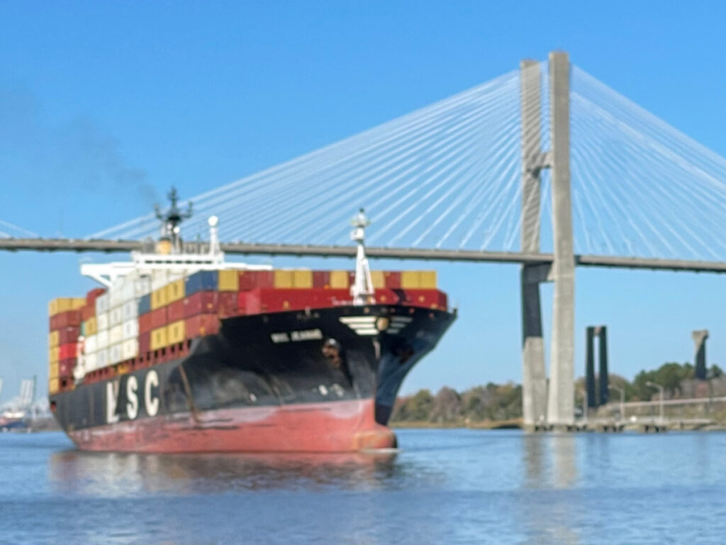 A container ship under the Talmadge Memorial Bridge in Savannah, GA